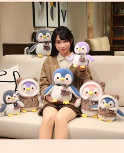 Cute penguin plush toy scene showcase, soft stuffed animal doll with scarf and coat details.