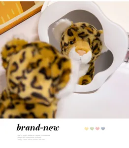Adorable jouet en peluche léopard de simulation poupée animal emourrant cadeau pour enfants.