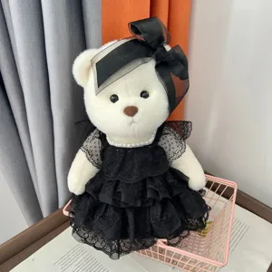 Süßer Plüsch Teddybär mit einem schwarzen Spitzenkleid und Schleife für Dekoration