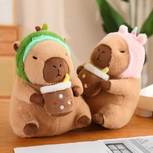Cute capybara plush toy holding bubble tea with funny hat, soft stuffed animal doll gift.