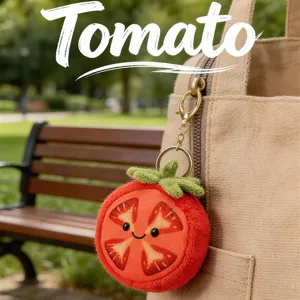 Joli porte-clés en peluche tomate sur sac, charmant accessoire de sac en peluche douce.