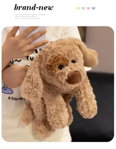 Detail shot of the cute soft plush puppy toy with fluffy curly fur and long floppy ears.
