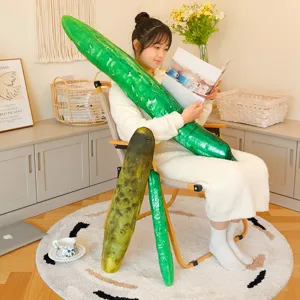 Giant green cucumber plush toy pillow, funny cartoon vegetable stuffed doll for home decor.