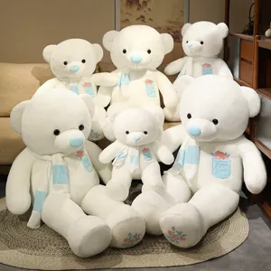 Orsacchiotto di peluche bianco morbido bambola con sciarpa e tasca di fiori regalo per bambini.