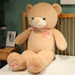 Large beige plush teddy bear skin unfinished cover cute stuffed animal doll with sweet heart embroidery.