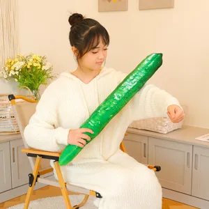 Detailed view of cute giant cucumber plush toy pillow, soft green stuffed vegetable doll.