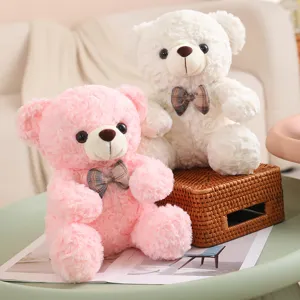 Cute sitting teddy bear plush toy doll, soft stuffed animal toy detail view for kids and gift.