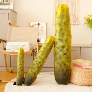Detailed view of cute cartoon cucumber plush toy doll, soft green pickle pillow for home.