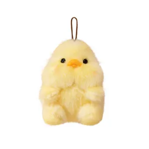 Cute fluffy yellow chick plush keychain toy, soft stuffed animal bag pendant accessory.