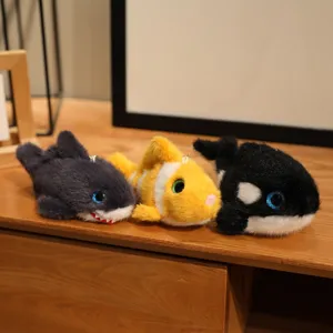 Cute marine animal plush toy keychain with shark, clownfish and killer whale designs.