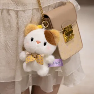 Simpatico ciondolo peluche gatto con fiocco, morbida bambola animale ciondolo per borsa.