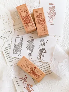 Vintage floral wooden stamp set with delicate botanical illustrations for journaling crafts.