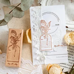Vintage wooden rubber stamp with lily of the valley design for journaling craft and diy.