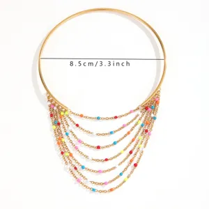 Bracciale da braccio a catena multistrato dorato con nappe di perline colorate, stile boho.