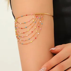 Bracciale da braccio a catena multistrato bohémien da donna, gioiello con perline colorate e nappe.