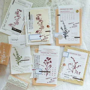 Vintage botanical wooden stamps and scrapbooking sticker materials for journaling arts.