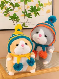 Cute hamster plush toy detail view, soft stuffed animal doll with knitted hat and scarf.