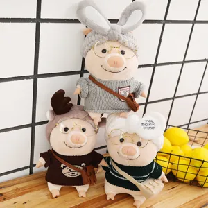 Cute plush pig dolls wearing sweaters and cute glasses, perfect as travel companion gifts.