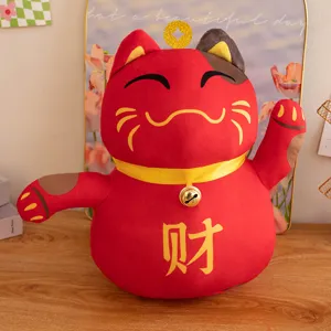 Cute red lucky cat plush toy detail, featuring golden bell and wealth character embroidery.