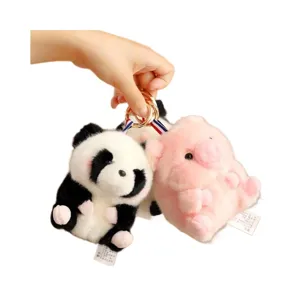 Cute plush panda and pig keychain charm, soft stuffed animal bag pendant accessory.
