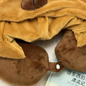 Almohada de viaje de felpa con capucha diseño de carpincho cojín de cuello suave en forma de U.