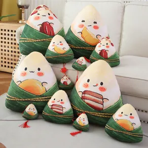 Cute cartoon zongzi plush pillow and keychain set, soft stuffed rice dumpling cushion decor.