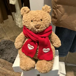 Süßer brauner Plüsch Teddybär Kuscheltier mit rotem Strickschal, perfektes Geschenk.