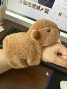 Cute capybara plush slap bracelet detail, soft wristband toy accessory for daily wear and fun.