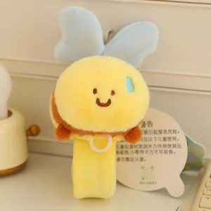 Cute cartoon bee snap bracelet plush toy detail shot, soft wristband accessory for kids gift.