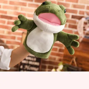 Lindo títere de mano de rana verde de peluche para historias interactivas infantiles