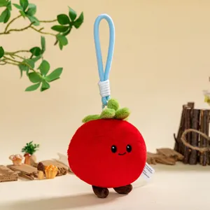 Cute tomato plush toy bag pendant, red stuffed doll with blue lanyard and cute feet variant.
