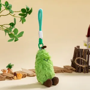 Cute green furry plush toy keychain with brown corduroy feet, fluffy lovely bag charm