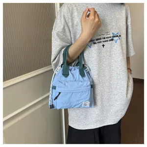 Sac à main décontracté bleu clair avec cordon et joli sac porté épaule pour usage quotidien