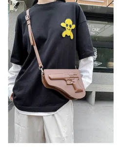 Bolso cruzado marrón con forma de pistola elegante diseño de nicho bolso de hombro de cuero PU