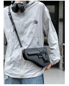 Detalles del bolso cruzado negro con forma de pistola de piel sintética, estilo urbano.