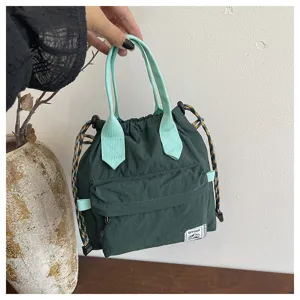 Grand sac seau vert avec poignées menthe sac fourre-tout décontracté minimaliste élégant.