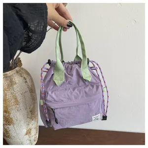 Sac seau coréen décontracté unicolore avec cordon de serrage et poignée pour femme chic