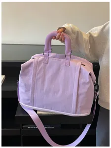 Large capacity purple travel duffel bag with shoulder strap and stylish design for daily use