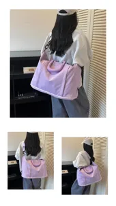 Large capacity solid color light travel handbag shoulder bag fashionable portable storage duffel bag.