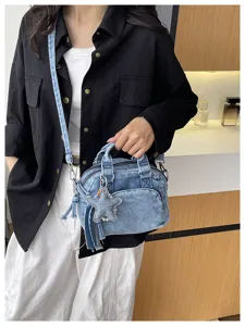 Denim Boston bag with star pendant, chic crossbody handbag for women, casual commuter daily use.