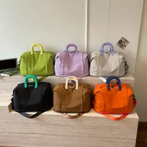 Large capacity solid color lightweight travel handbag and crossbody bag for daily use.