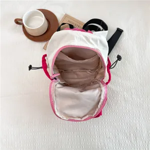 Detail view of the open contrast color outdoor backpack interior compartment structure