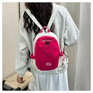 Stylish colorblock backpack with drawstring closure and mesh side pockets for daily outdoor use.