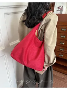 Retro casual commuting large capacity women's red solid color suede shoulder tote bag.