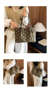 Detail showcase of the stylish polka dot tote bag, large capacity casual shoulder bag for commuting.