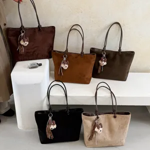 Stylish large capacity suede tote bag with cute bear charm, minimalist casual shoulder bag.