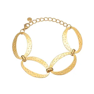 Bracciale a maglie ovali strutturate dorate da donna, gioielli geometrici di tendenza.