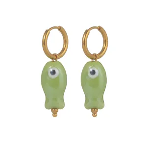 Charming green ceramic fish hoop earrings with gold tone hardware, cute dopamine style jewelry.