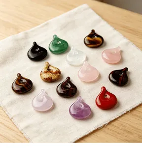 Natural semi-precious stone twisted magatama safety buckle DIY jewelry accessories pendant.