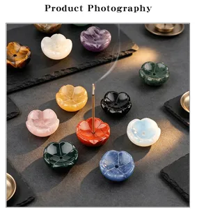 Crystal lotus incense holder detail view showing multi-color gemstone ash catcher base.